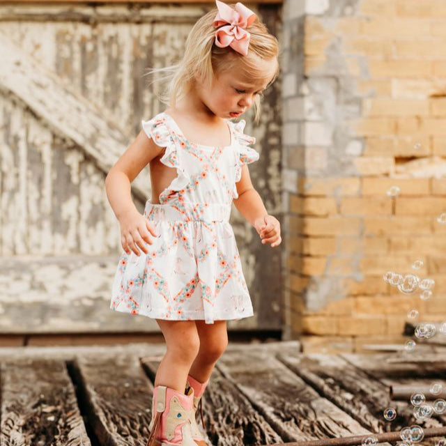 Floral Boot Cross Romper, Size 0-2T (Sold pack of 8)